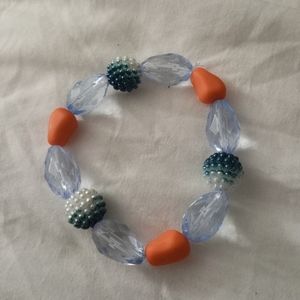 Hand Crafted Cerulean blue and orange beaded bracelet